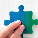 Icône de main qui pose une pièce de puzzle, symbolisant la mise en œuvre.